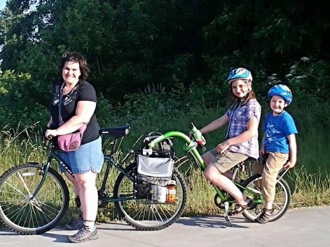 Mom & 2 kids on a bike